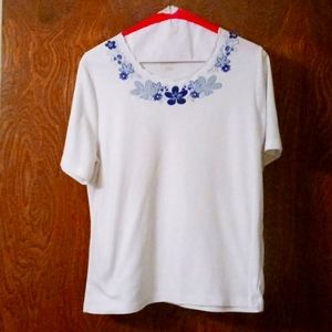 Allison Daley M white tee with blue embroidery and applique flowers at neckline
